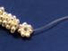 3mm Bright White Bali Style Silver Daisy Strand of 200 beads