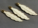 Gold Electroplated edged feather Stone Carved Pendant